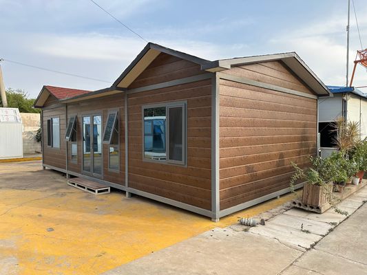 Χάλυβα Φτιαγμένο Σταθερό ξύλο Στάρια Prefab Container House Flat Pack σε πολλαπλά μεγέθη με προαιρετικά τείχη και στέγη