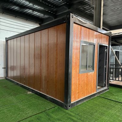 Προπαρασκευασμένο Windproof Sandwich Panel Container House Flat Pack με 3C/CE/CL/SAA τυποποιημένη ηλεκτρική ενέργεια και σταθερή δομή