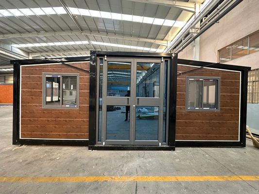 30ft Διαστημικό επεκτάσιμη κατοικία Αδιάβροχο χάλυβα πλαίσιο προκατασκευασμένο σπίτι δοχείου με ευέλικτη συναρμολόγηση και πολλαπλές λειτουργίες